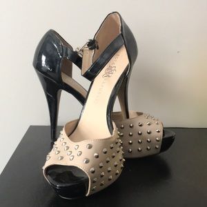 Black and pink studded pumps